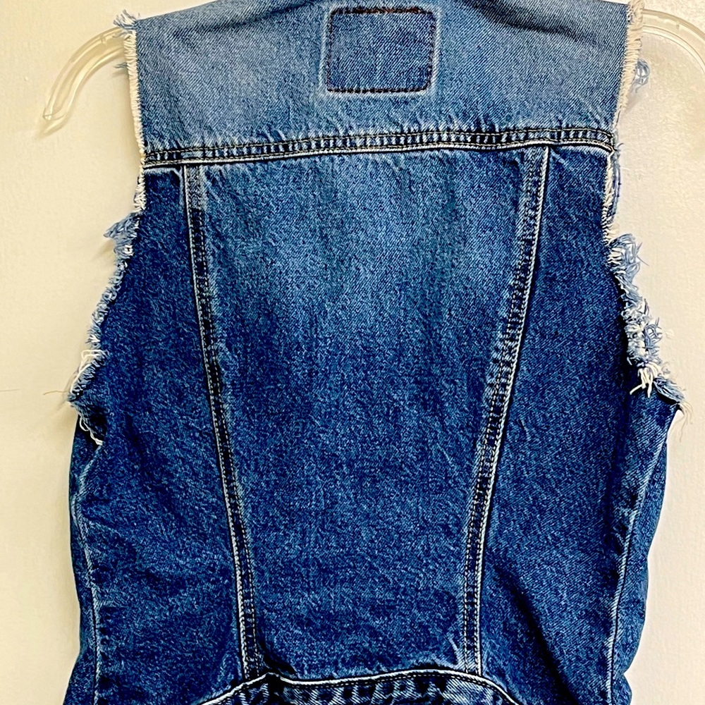 Denim vest with cut off sleeves
